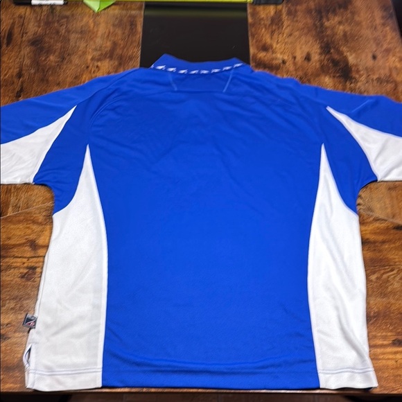 Sporty Blue and White Polo Shirt with Moisture-Wicking Fabric - Picture 6 of 6